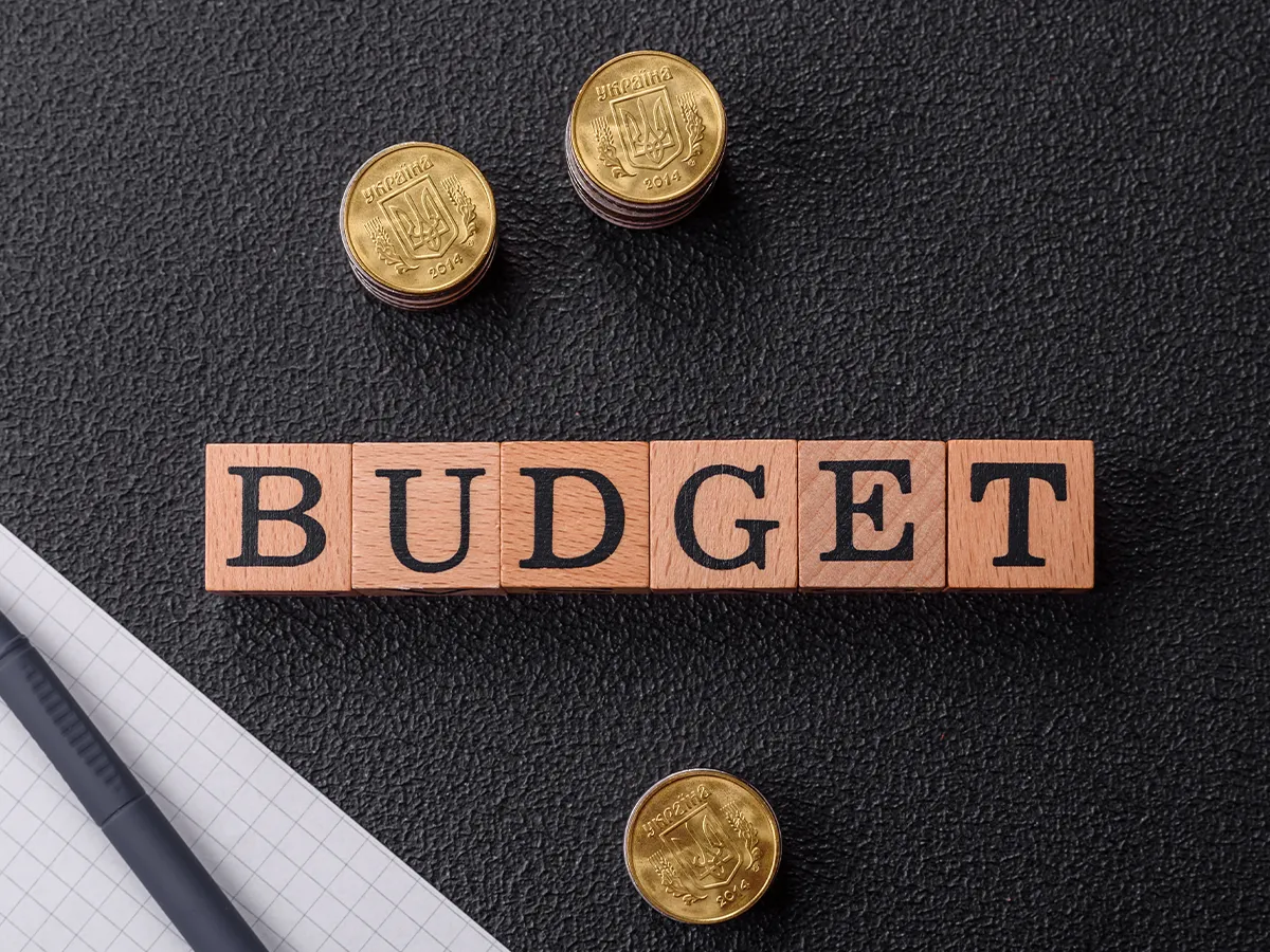 settle with a realistic marketing budget